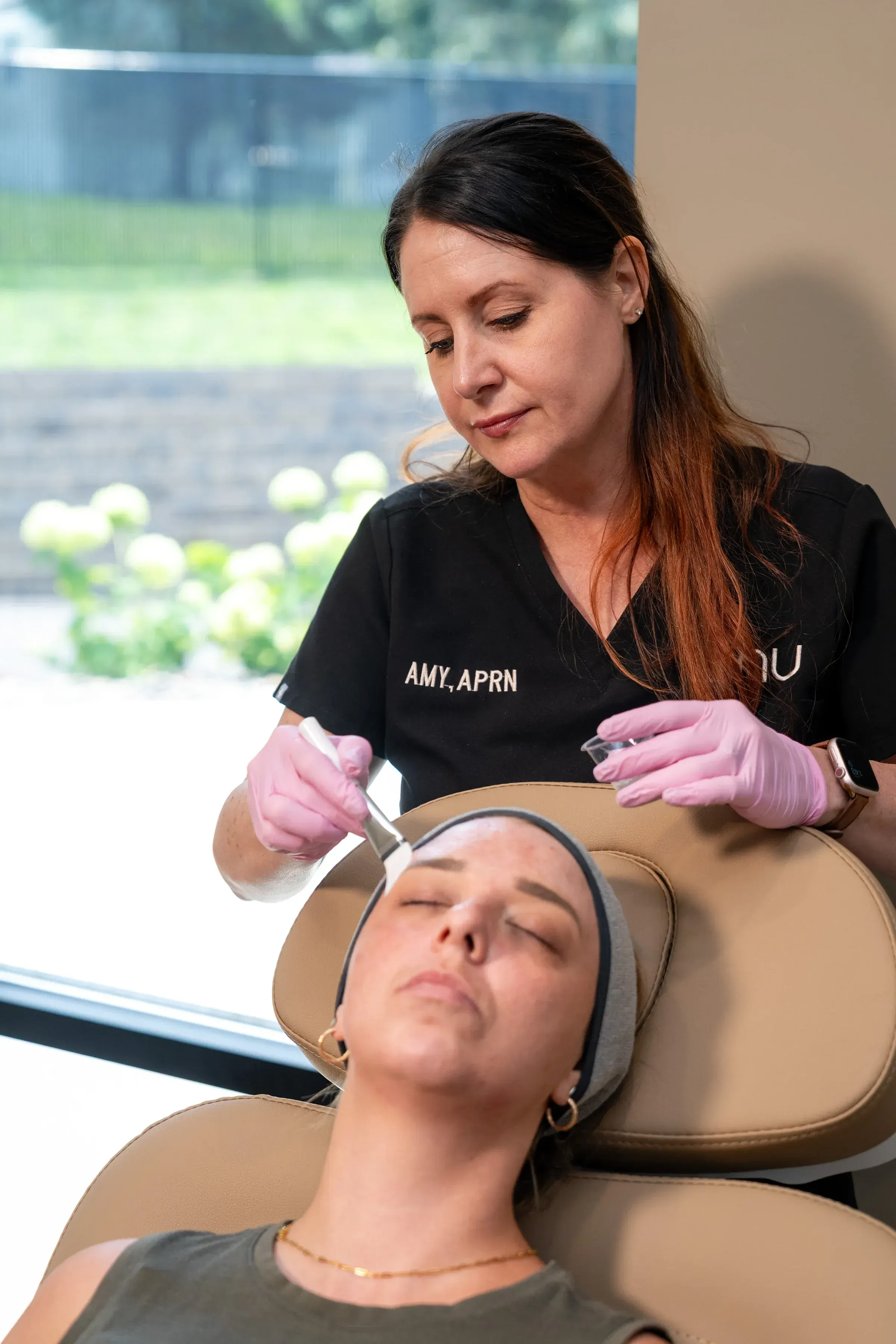 Patient consultation discussing chemical peel benefits