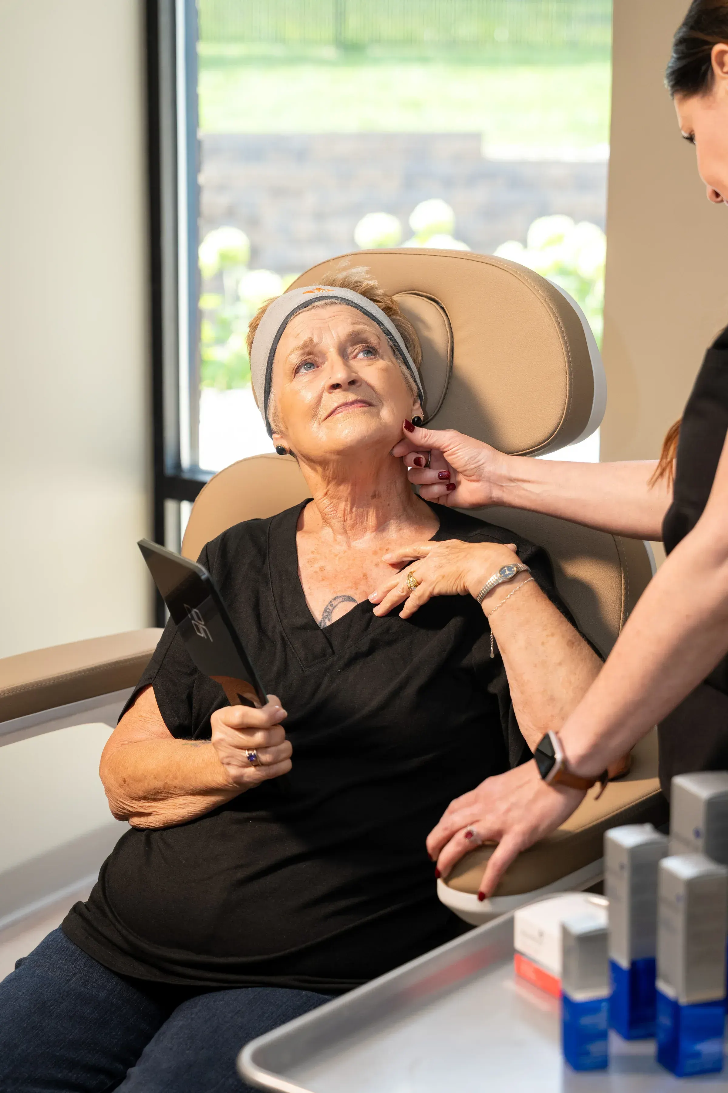 Patient consultation discussing skincare benefits