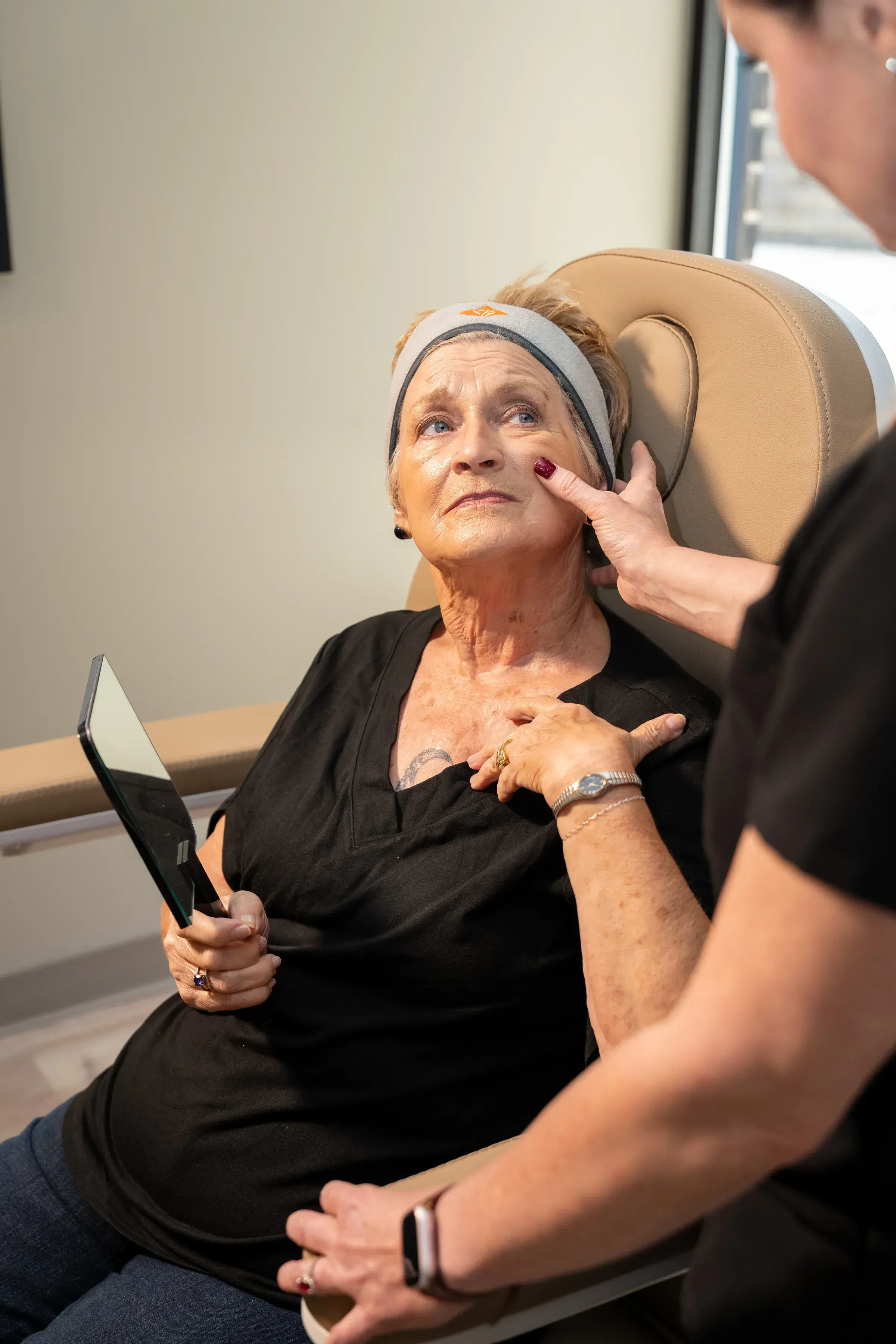 Confident patient considering skincare treatment