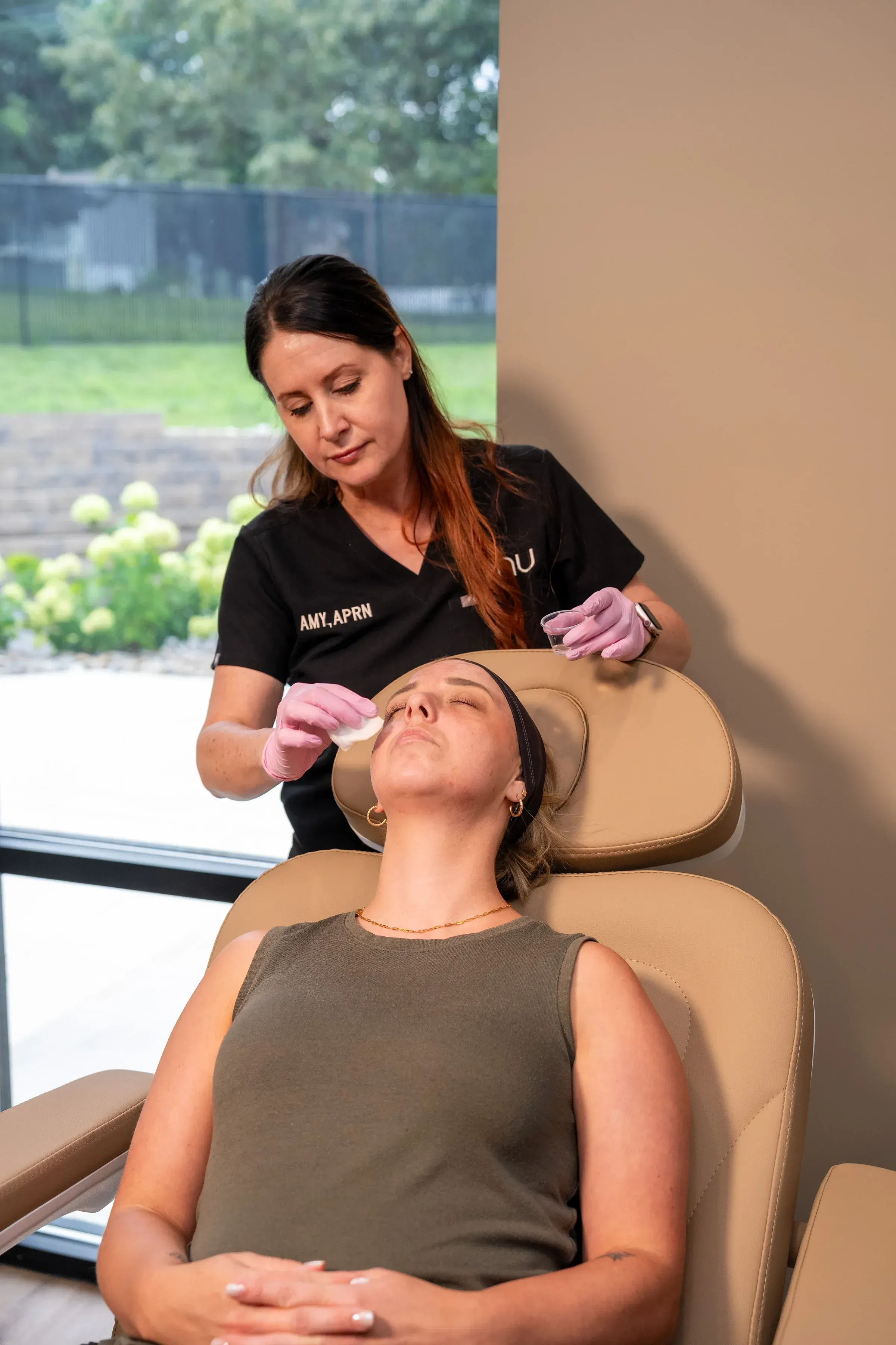 Confident patient considering skincare treatment