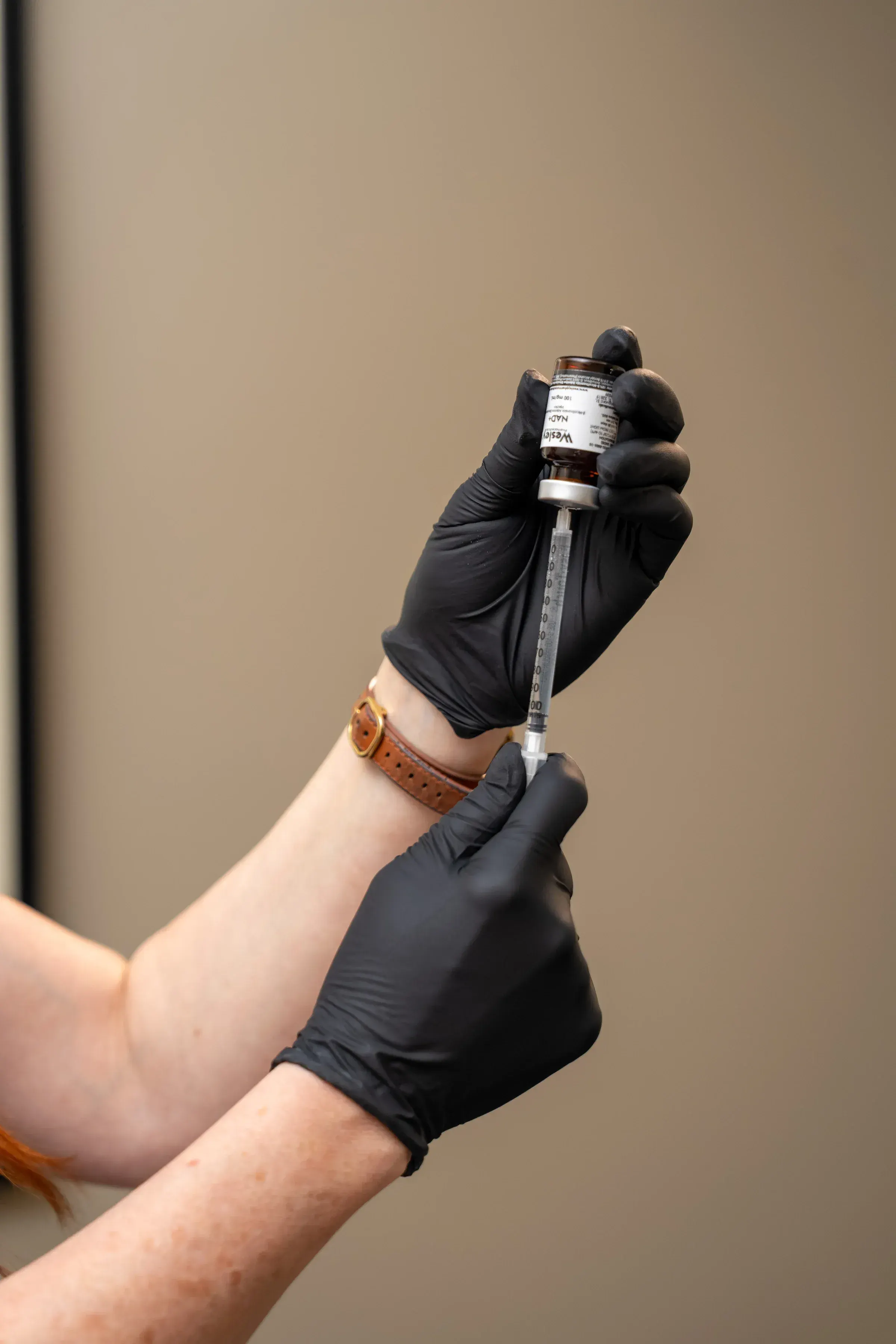 Patient consultation discussing peptide benefits