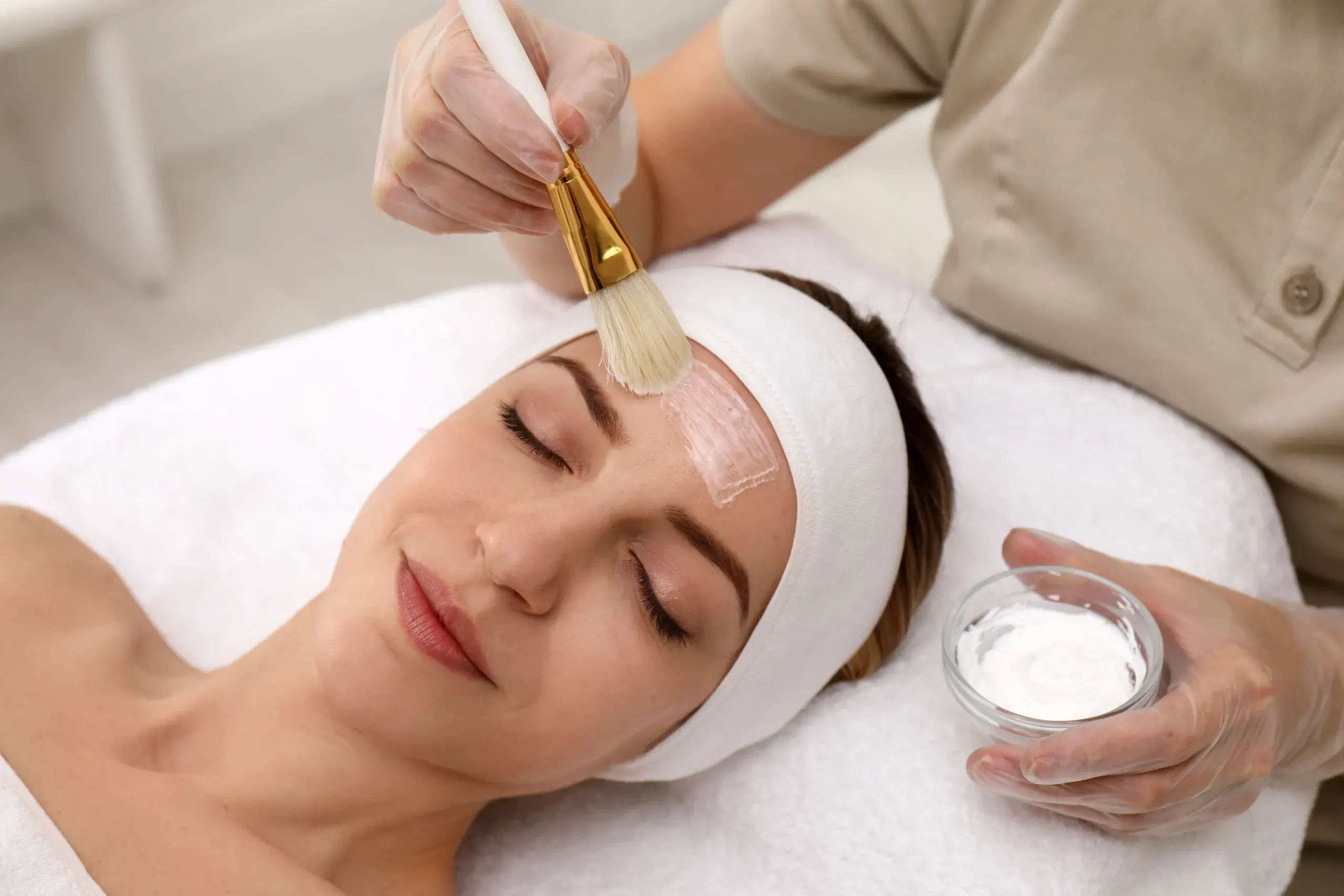 Patient consultation discussing chemical peel benefits