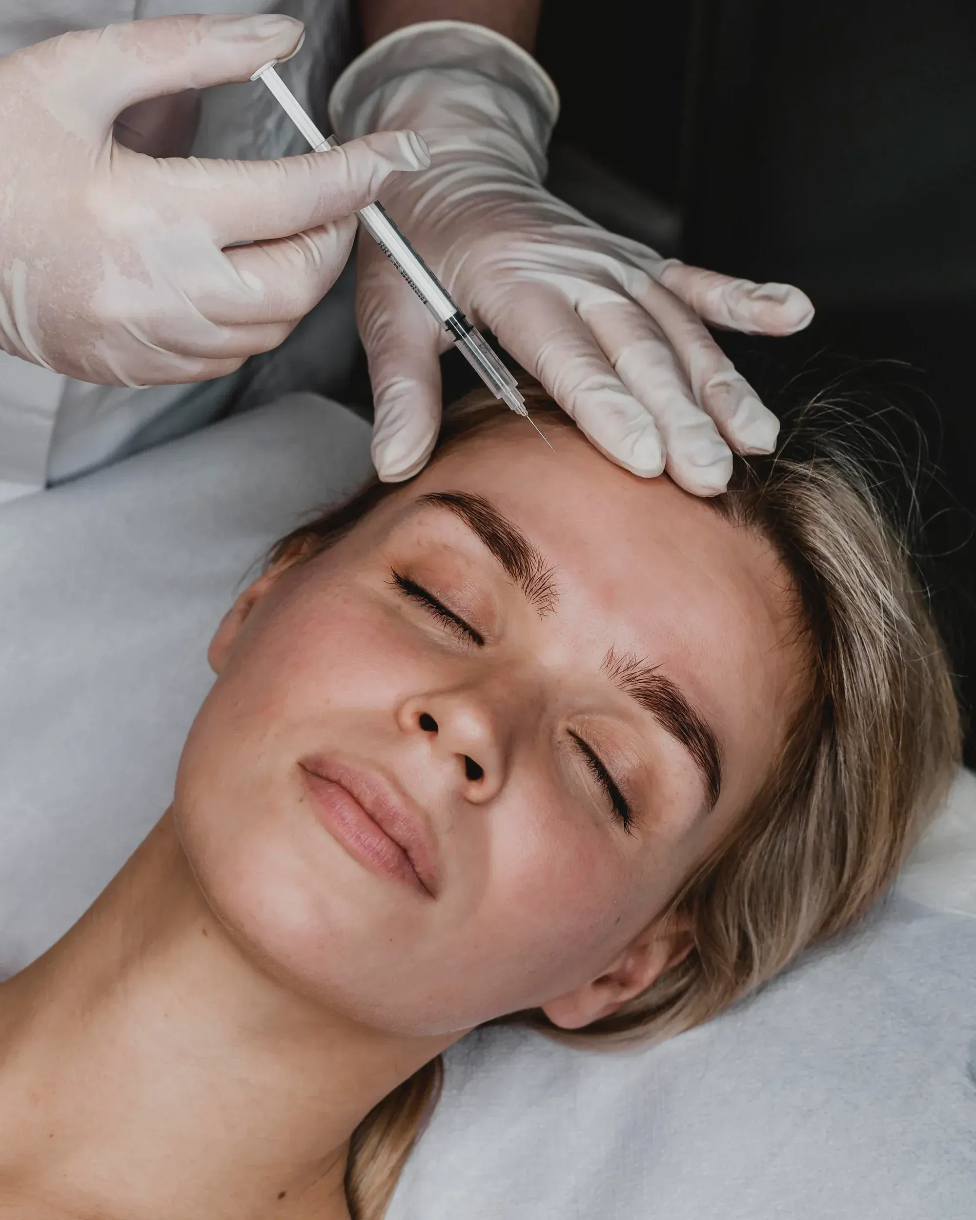 Abstract soft gradient background representing facial rejuvenation and wellness